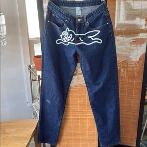 XGXFamily Stylish Blue Denim Jeans with a Cat Across Zipper, Skulls on back